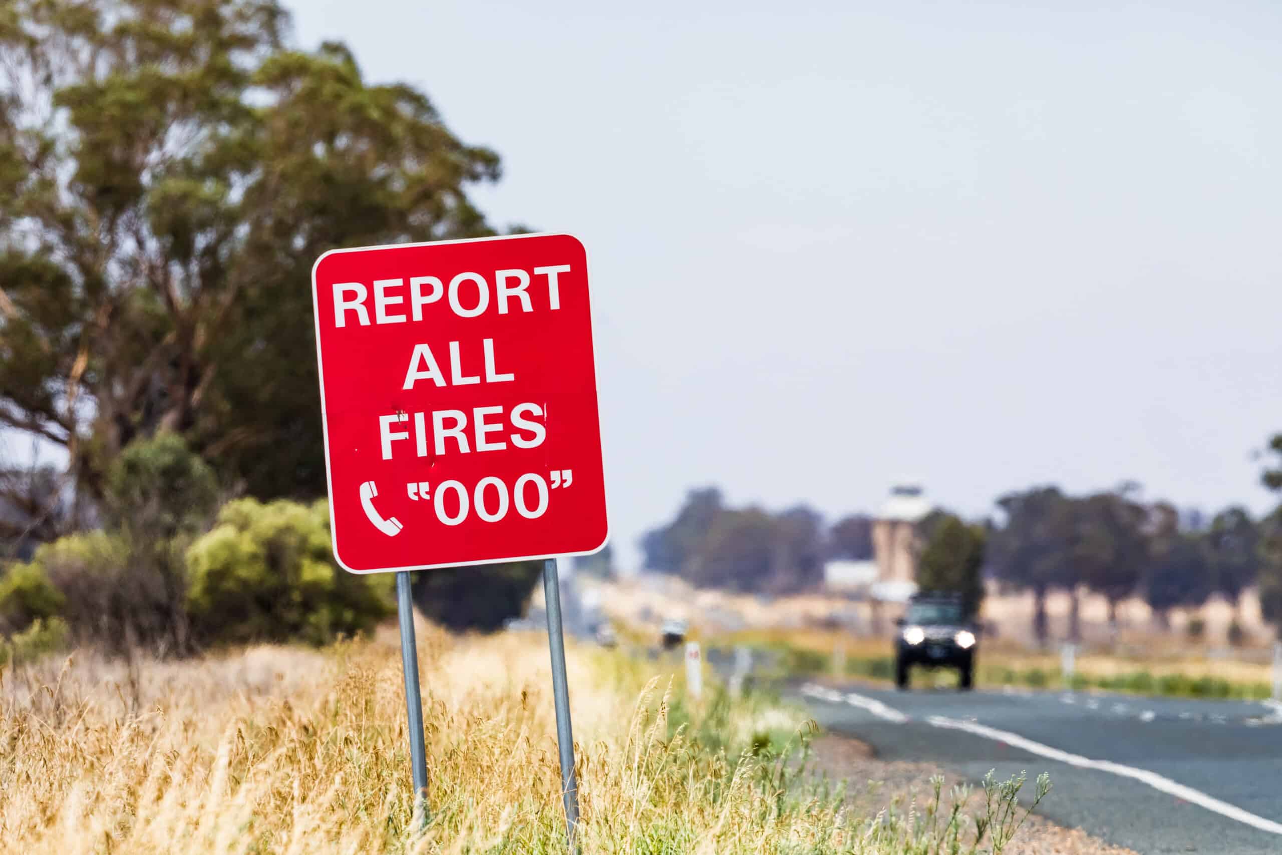 Reports all fires 000 sign